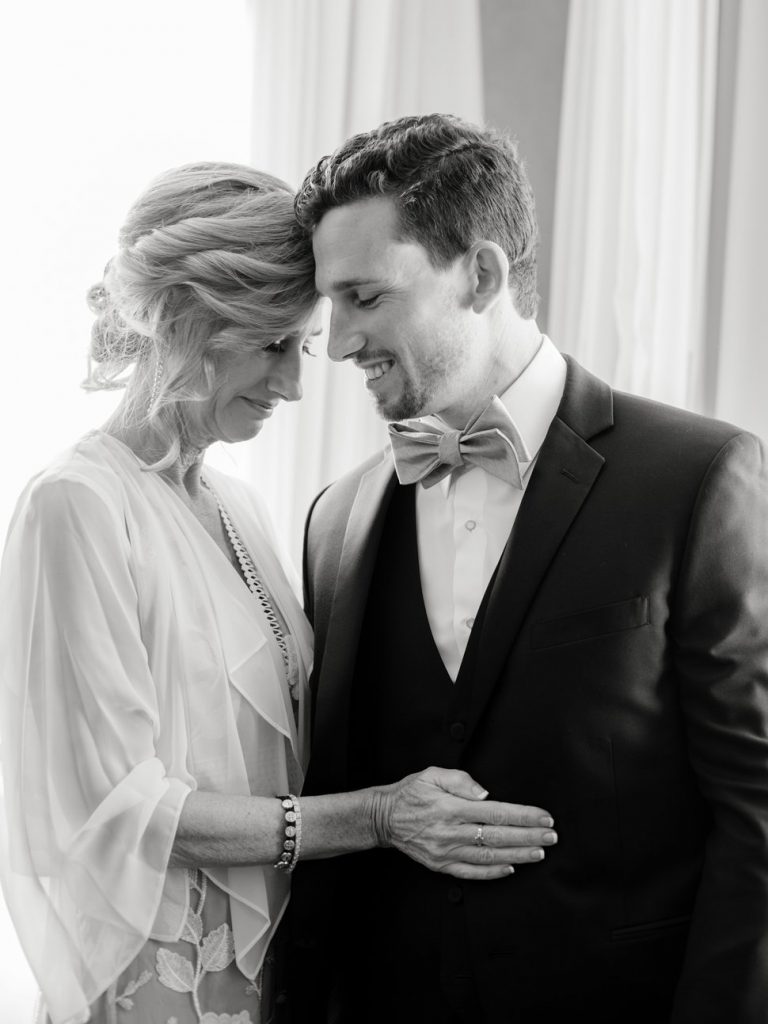groom with mom new orleans wedding photographer